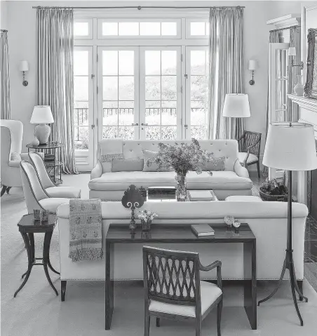  ?? John Coolidge ?? The sofas and table in this tonal living room are from Joyce’s Dessin Fournir furniture collection.