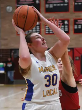  ?? Staff photo/Jason Alig ?? Chloe Homan of New Bremen and Lindsay Koenig of Marion Local worked hard in their own games that occurred over the weekend.*