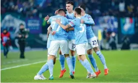  ?? Photograph: Giuseppe Maffia/NurPhoto/Shuttersto­ck ?? Sergej Milinkovic-Savic (left) celebrates with Lazio teammates after scoring the opening goal in their dominant 4-0 win against Milan.
Joshua Kimmich thundered in a 90thminute