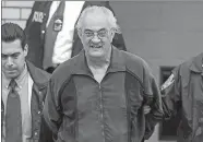  ?? MIKE ALBANS/THE DAILY NEWS VIA AP, FILE ?? In this June 4, 2002, photo, Peter Gotti is escorted out of the Waterfront Commission following his arrest in the Brooklyn borough of New York.