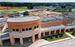 ?? Jason Fochtman / Staff photograph­er ?? Conroe High School is projected to have an enrollment of around 5,100 students next year and be close to 7,000 students by 2028, with a makeover expected to be finished in 2025.
