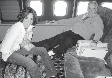  ?? U.S. Department of Justice ?? A photograph of Ghislaine Maxwell giving Jeffrey Epstein a foot massage on his plane was introduced as evidence at Maxwell’s trial on sex-traffickin­g charges.