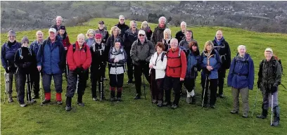  ??  ?? ●● The group gather on the summit of Nab’s Head