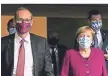  ?? FOTO: DPA ?? Michael Müller, derzeit Vorsitzend­er der MPK (l.), sein Vorgänger Markus Söder und die Kanzlerin.