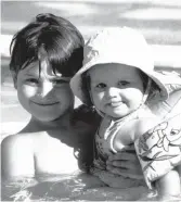 ??  ?? Water baby: Alice Whaley, 2, and brother Tom, 9, in the hotel pool, 2000