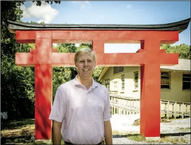  ?? (Arkansas Democrat-Gazette/Cary Jenkins) ?? John Mark Goings stands in front of a Torii Gate that will mark the entrance of Wabi Sabi After Dark, an Oct. 1 fundraiser for Camp Aldersgate.