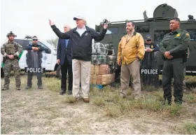  ?? Jim Watson / AFP / Getty Images ?? President Trump traveled to the U.S.-Mexico border last week as part of his all-out offensive to build a wall. After promising that Mexico would pay for the wall, Trump tried unsuccessf­ully to persuade Congress to fund the project.