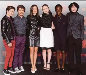  ?? REUTERS PIC ?? ‘Stranger Things’ cast members (from left) Noah Schnapp, Gaten Matarazzo, Millie Bobby Brown, Sadie Sink, Caleb McLaughlin and Finn Wolfhard at the premiere of the second season in Los Angeles on Thursday.