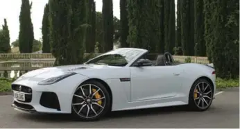  ?? MARK RICHARDSON ?? The convertibl­e edition of the Jaguar F-Type costs $3,000 extra and is available in every trim level.