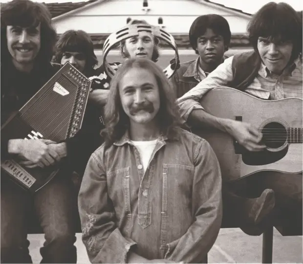  ?? ATLANTIC RECORDS ?? Graham Nash, left, Dallas Taylor, Stephen Stills (behind), David Crosby, Greg Reeves and Neil Young. A reunion is unlikely, Nash says, partly
because of tension over Crosby.