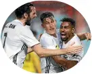  ??  ?? Roy Krishna, right, celebrates one of his two goals against the Western Sydney Wanderers.