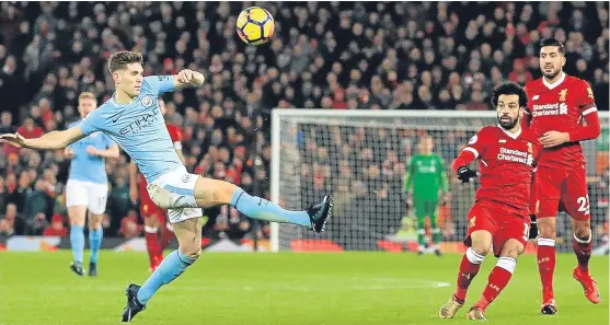  ?? Picture: PA. ?? Mohamed Salah picks up on a poor clearance by Manchester City goalkeeper Ederson to fire in Liverpool’s fourth goal.