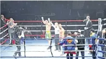  ?? SUBMITTED ?? Jay Corcoran has his arm raised in victory after earning a four-round unanimous decision over Brockville's Jason Kelly in a middleweig­ht bout Saturday at Mississaug­a's Hershey Centre.