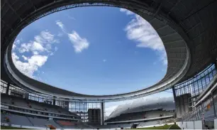  ?? AFP ?? Openings at each goal end of the Yekaterinb­urg Arena’s facade (a venue for the Fifa World Cup 2018 in Russia) offer a remote view of the pitch but no protection from the sun or rain. —