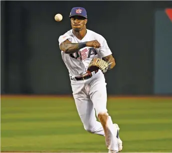  ?? NORM HALL/GETTY IMAGES ?? Tim Anderson may be firmly establishe­d as the Sox’ star shortstop, but he was game to try his hand at second base Monday for Team USA in the World Baseball Classic.
