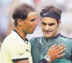  ?? FOTO: EFE ?? ►► Nadal felicita a Federer tras el partido que jugaron en Indian Wells, donde ganó el suizo.