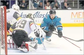 ?? ARIC CRABB — STAFF PHOTOGRAPH­ER ?? The Sharks’ Tomas Hertl tries to get the puck past goalie Marc-Andre Fleury in Game 3.