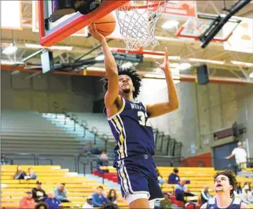  ?? Nick Coza For The Times ?? JAZZ GARDNER, a 7-foot Hacienda Heights Los Altos transfer who can play on the perimeter, finished with 15 points to help the Wildcats top Bishop O’Connell (Virginia) 78-68 at Mater Dei in Santa Ana.