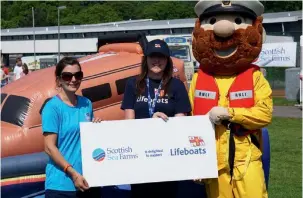  ??  ?? Above: (from left to right): Georgie Mackenzie, Scottish Sea Farms; Lynsey Anderson, RNLI; and RNLI mascot Stormy Stan