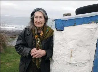  ??  ?? The late Leland Bardwell who died in June 2016 pictured outside her seaside cottage in Ballinful.