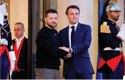  ?? AFP PHOTO ?? SECURITY PACT
French President Emmanuel Macron and Ukrainian leader Volodymyr Zelenskyy plan to sign a bilateral security agreement at the Elysee Palace on Friday, Feb. 16, 2024.