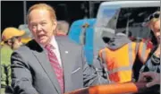  ?? AP ?? Actress Melissa McCarthy took her impersonat­ion of Sean Spicer, the White House press secretary, to the streets of New York City on Friday, rolling through midtown traffic on a motorised lectern in an apparent shoot for Saturday Night Live.