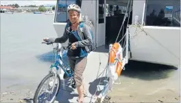  ?? Photo: PATRICK HAMILTON/
FAIRFAX NZ ?? Day tripper: Sara Kelly, of Christchur­ch, disembarks from the Flat Bottom Fairy on the Tasman Great Taste Trail between Rabbit Island and Mapua yesterday.