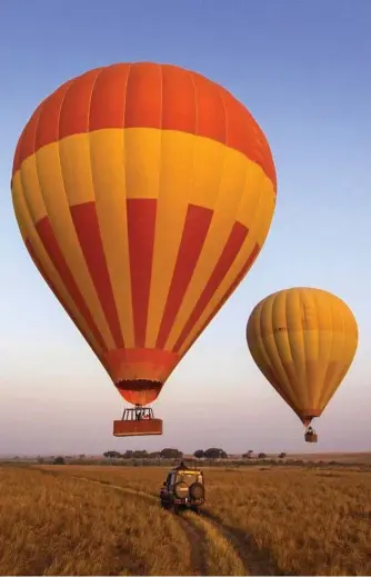  ?? Photo: iStock ?? CHOOSE YOUR SCENE: Hot air balloons over the Masai Mara in Kenya.