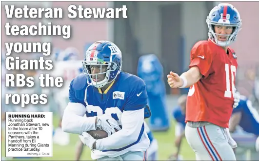  ?? Anthony J. Causi ?? RUNNING HARD: Running back Jonathan Stewart, new to the team after 10 seasons with the Panthers, takes a handoff from Eli Manning during Giants practice Saturday.