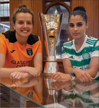  ?? Picture: Colin Mearns ?? Hayley Lauder (left) and Jacynta Galabadaar­achchi with the Scottish Women’s Cup at Glasgow Women’s Library yesterday.