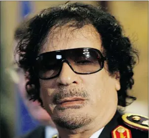  ?? FRAn CO ORIGLIA/
GETTY IMAGE ?? When he was Libyan leader, Moammar Gadhafi did a number of things to curry U.S. favour, including offering intelligen­ce on Islamists and abandoning the country’s weapons of mass destructio­n program.