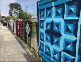  ?? PHOTOS BY ROBIN EPLEY — ADVOCATE-NEWS ?? One of the 2021 raffle quilts out for a sneak peek at the Ocean Wave Quilters’ annual show.