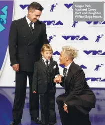  ??  ?? Singer Pink, husband Carey Hart and daughter Willow Sage Heart.