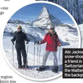  ??  ?? Abi Jackson snow-shoeing with a friend in Zermatt, Switzerlan­d, with the Matterhorn in the background