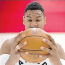  ?? CHRIS YOUNG/THE CANADIAN PRESS ?? The Raptors’ Jared Sullinger has some fun with a pose during media day for the team in Toronto on Monday.