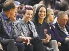  ?? Ezra Shaw / Getty Images 2019 ?? WNBA champion Sue Bird ( right), with girlfriend and soccer standout Megan Rapinoe, is glad she chose to freeze her eggs.