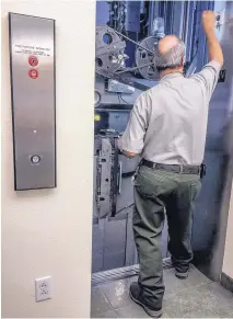  ?? ROBERTO E. ROSALES/JOURNAL ?? A maintenanc­e man works on a disabled elevator at Carlsbad Caverns in the summer of 2016. Officials say work has begun on modernizin­g the primary elevator system at the park. The work is scheduled to be completed in May.