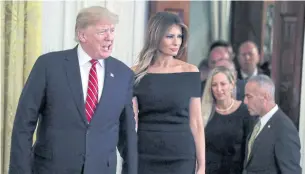  ?? EPA ?? President Donald Trump and First Lady Melania Trump arrive for a Hanukkah reception in the White House.