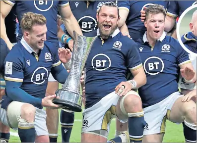  ??  ?? Scotland skipper Stuart Hogg and his men celebrate with the Auld Alliance trophy on Friday night.
Coach Gregor Townsend (inset above) hopes more success will follow