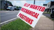  ?? MATT ROURKE — THE ASSOCIATED PRESS FILE ?? A help wanted sign is posted on the side of a road in Warminster in June.