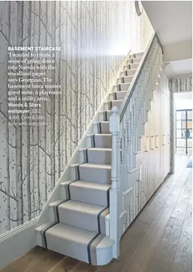  ??  ?? BASEMENT STAIRCASE ‘I wanted to create a sense of going down into Narnia with the woodland paper,’ says Georgina. The basement has a master guest suite, a playroom and a utility area. Woods &amp; Starswallp­aper, £82 a roll, Cole &amp; Son, cole-and-son.com.