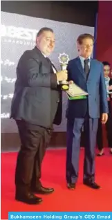  ??  ?? Bukhamseen Holding Group’s CEO Emad Bukhamseen receives his award.