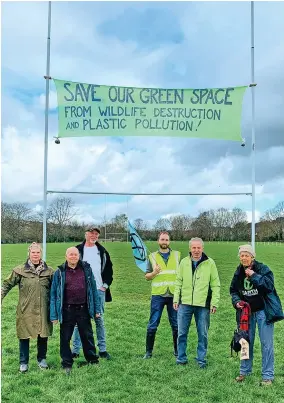  ?? ?? Extinction Rebellion members protesting against Exeter College’s plan to install a 3G rugby pitch at Flowerpot Playing Fields