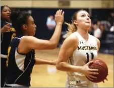  ?? Nikolas Samuels/The Signal ?? Hannah Forrar (11) breaks through the defense for a layup during a home game against Bethesda University on Tuesday.