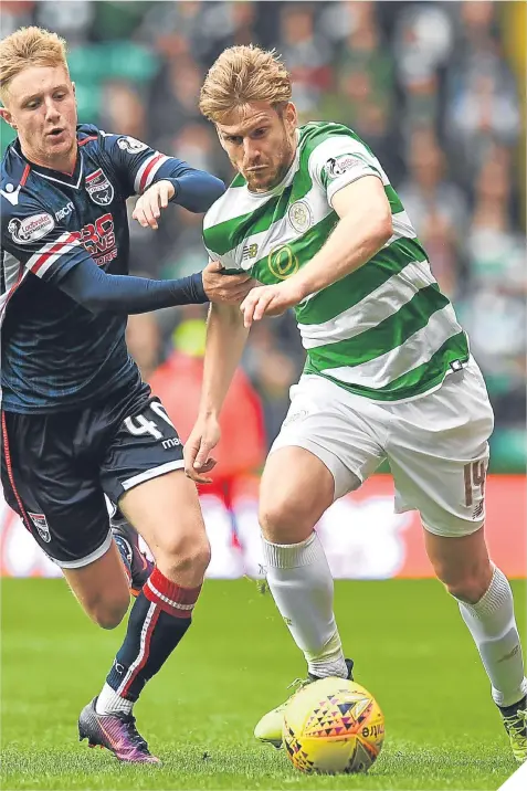  ??  ?? Ross County’s Davis Keillor-Dunn tries to take the ball from Stuart Armstrong.