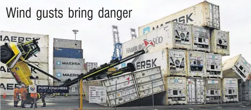  ?? PHOTO: STEPHEN JAQUIERY ?? Blow me down . . . A gust of wind toppled this sidelifter as it lifted a container at Port Otago yesterday.