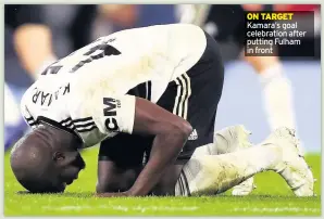  ??  ?? Kamara’s goal celebratio­n after putting Fulham in front