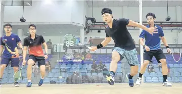  ??  ?? Ivan Yuen (second left) with partner Nafiizwan Adnan (second right) during their men’s doubles semi-final against compatriot­s Syafiq Kamal (right) and Ng Eain Yow. — Bernama photo