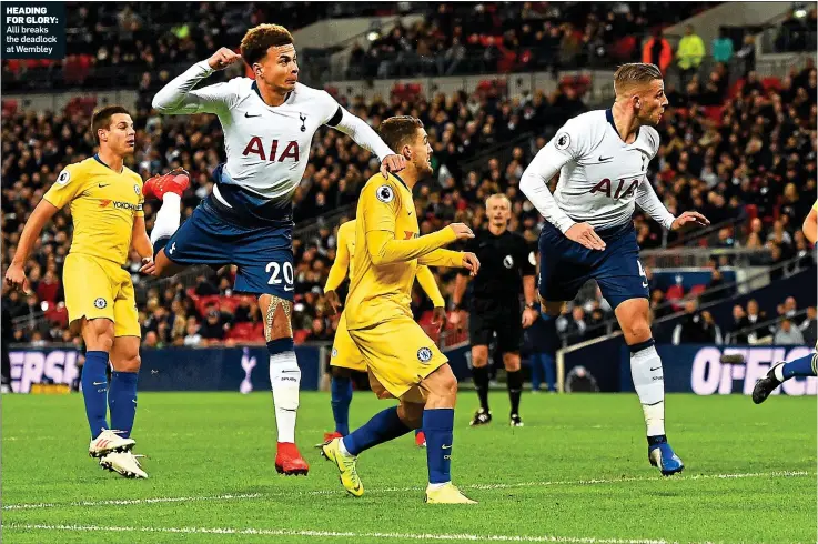  ??  ?? HEADING FOR GLORY:Alli breaks the deadlock at Wembley