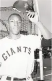  ?? Bettmann Archive 1959 ?? Willie McCovey as a rookie with the Giants standing near the batting cage at Seals Stadium in 1959.